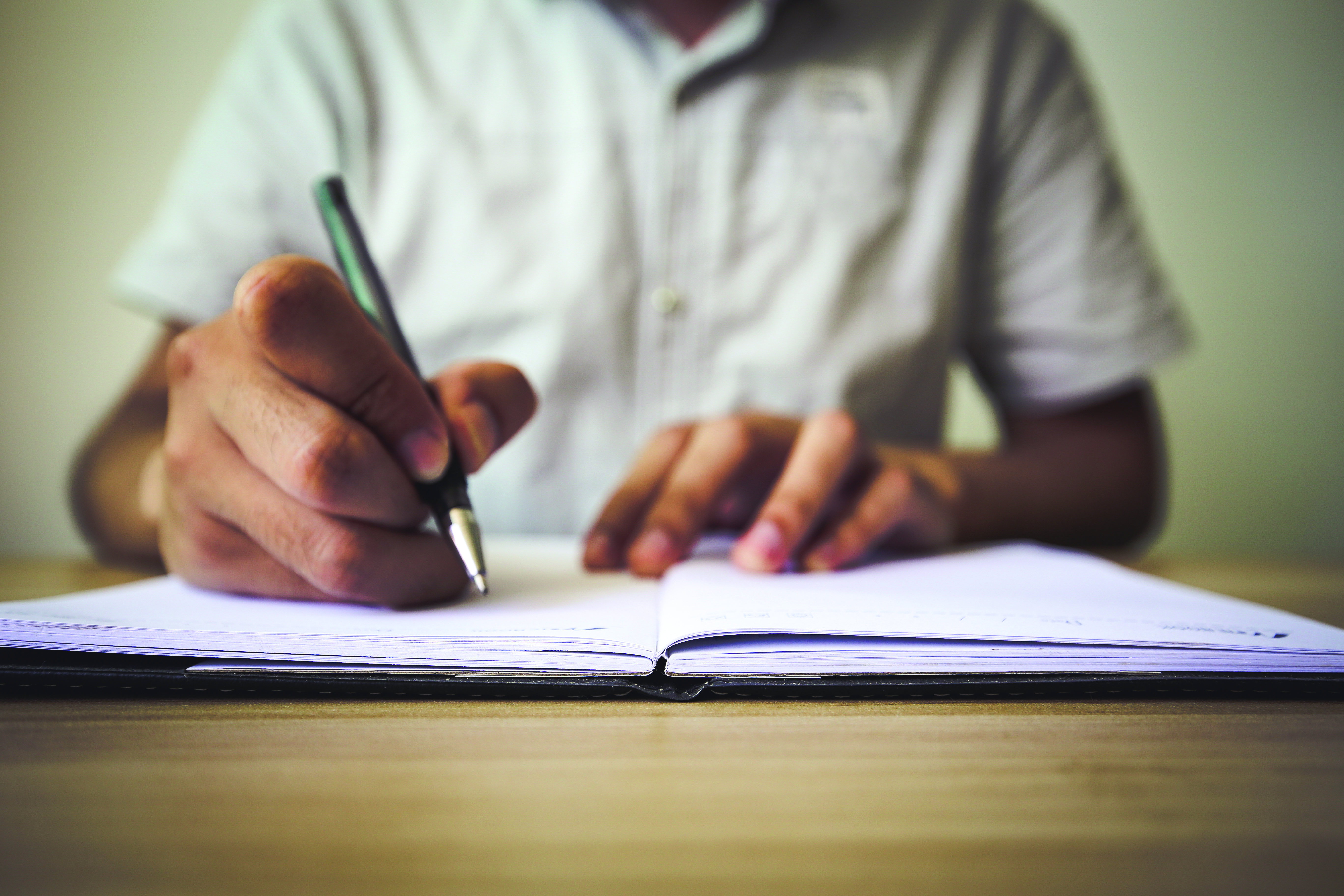 hires-p46_here_to_help_person_writing_in_notebook_istock_685520538.jpg hires-p46_here_to_help_person_writing_in_notebook_istock_685520538.jpg