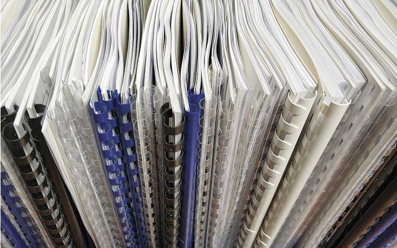 Here to help books in binders iStock