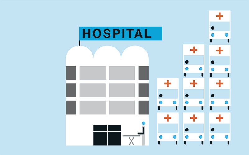 lots of ambulances waiting outside of hospital - credit-grundini-ikon-images-50160384.jpg